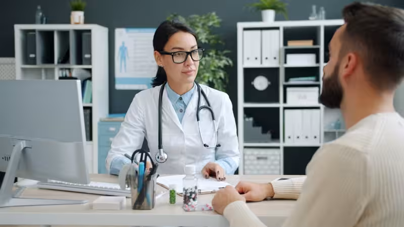 Doctor in clinic for Microsuction Vs. Ear Syringing - Information About Cambridge: Private Microsuction Ear Wax Removal In C...