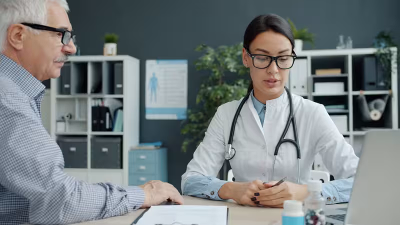 Services We Offer:: A doctor in a clinic Doctor in clinic for Services We Offer: - Hearing First Milton Keynes Price List And Fees