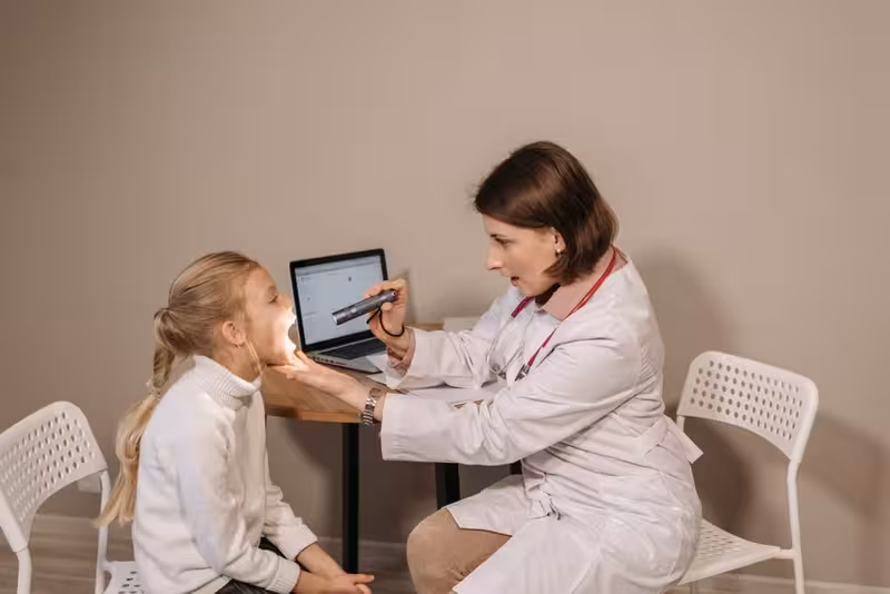Doctor in clinic for Fascinating Facts About Ealing - Travel Time To Ealing: Private Microsuction Ear Wax Removal In Ealing...
